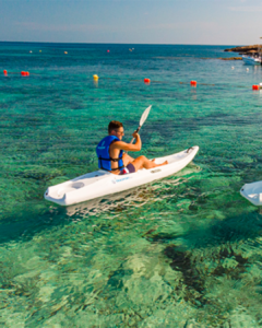 A Man doing kayak to Coral Lagoon in Tortuga Malta